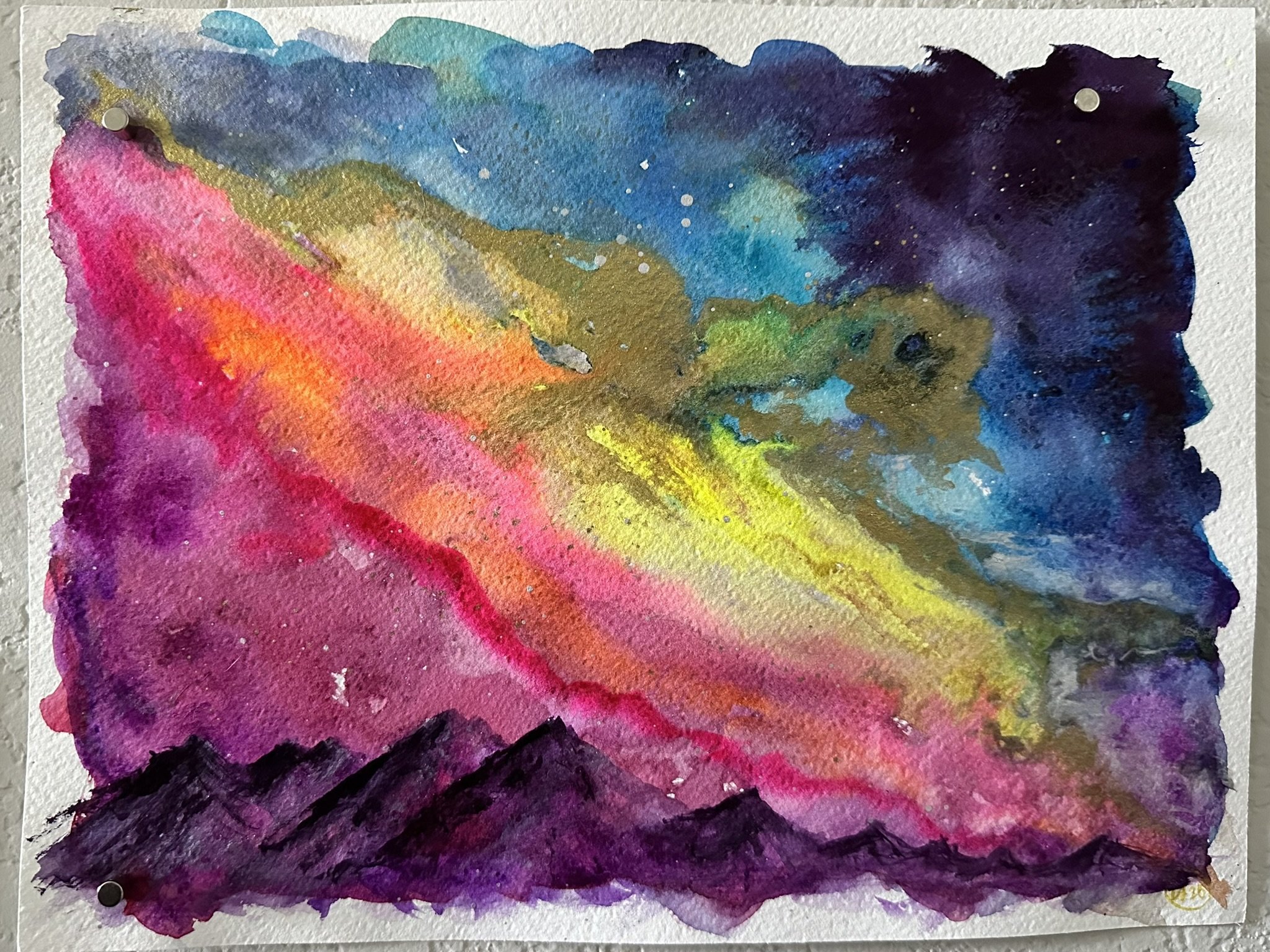 a rainbow-colored watercolor painting of mountains and a galactic sky