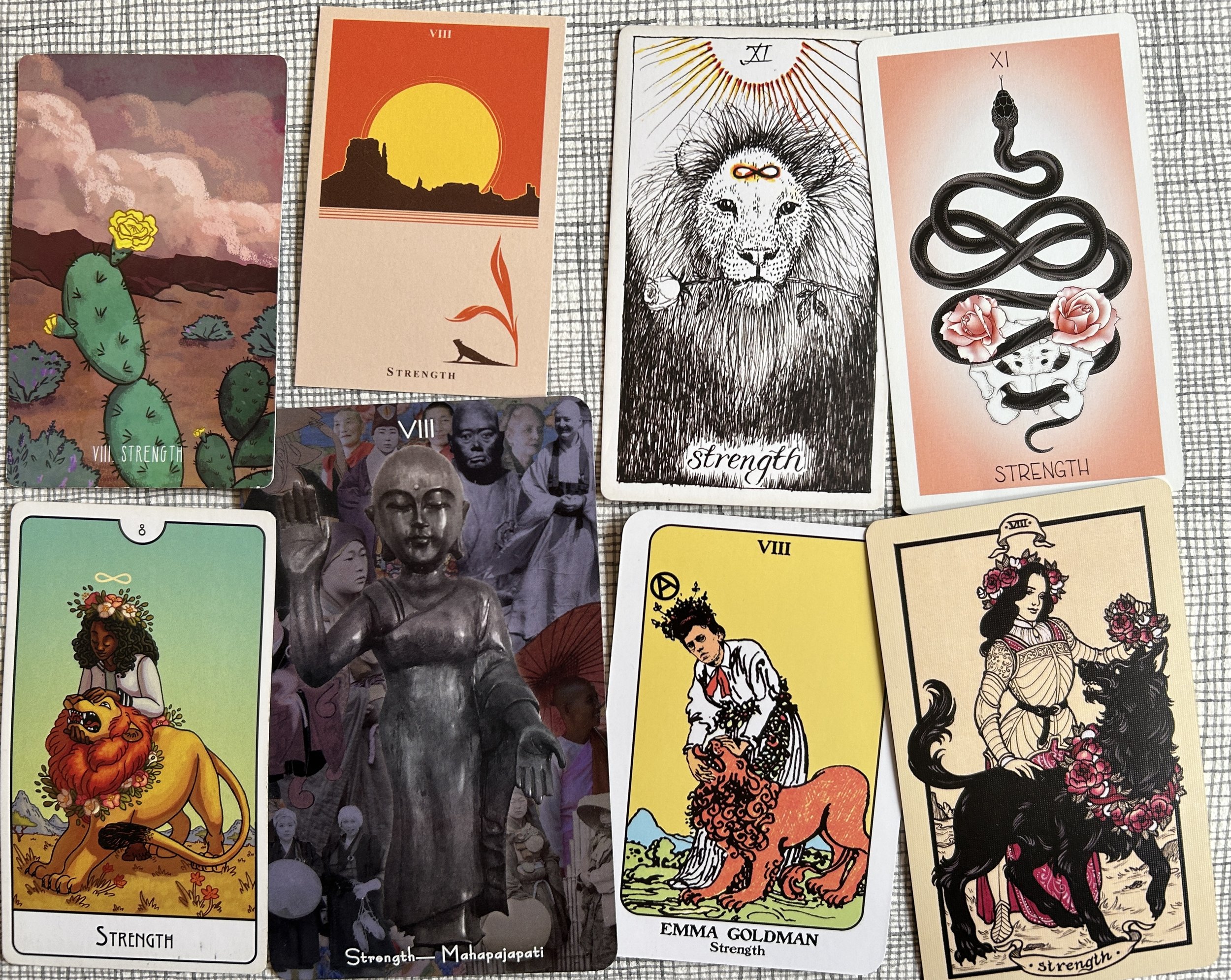 8 versions of the strength tarot card in two rows against a painted grid background
