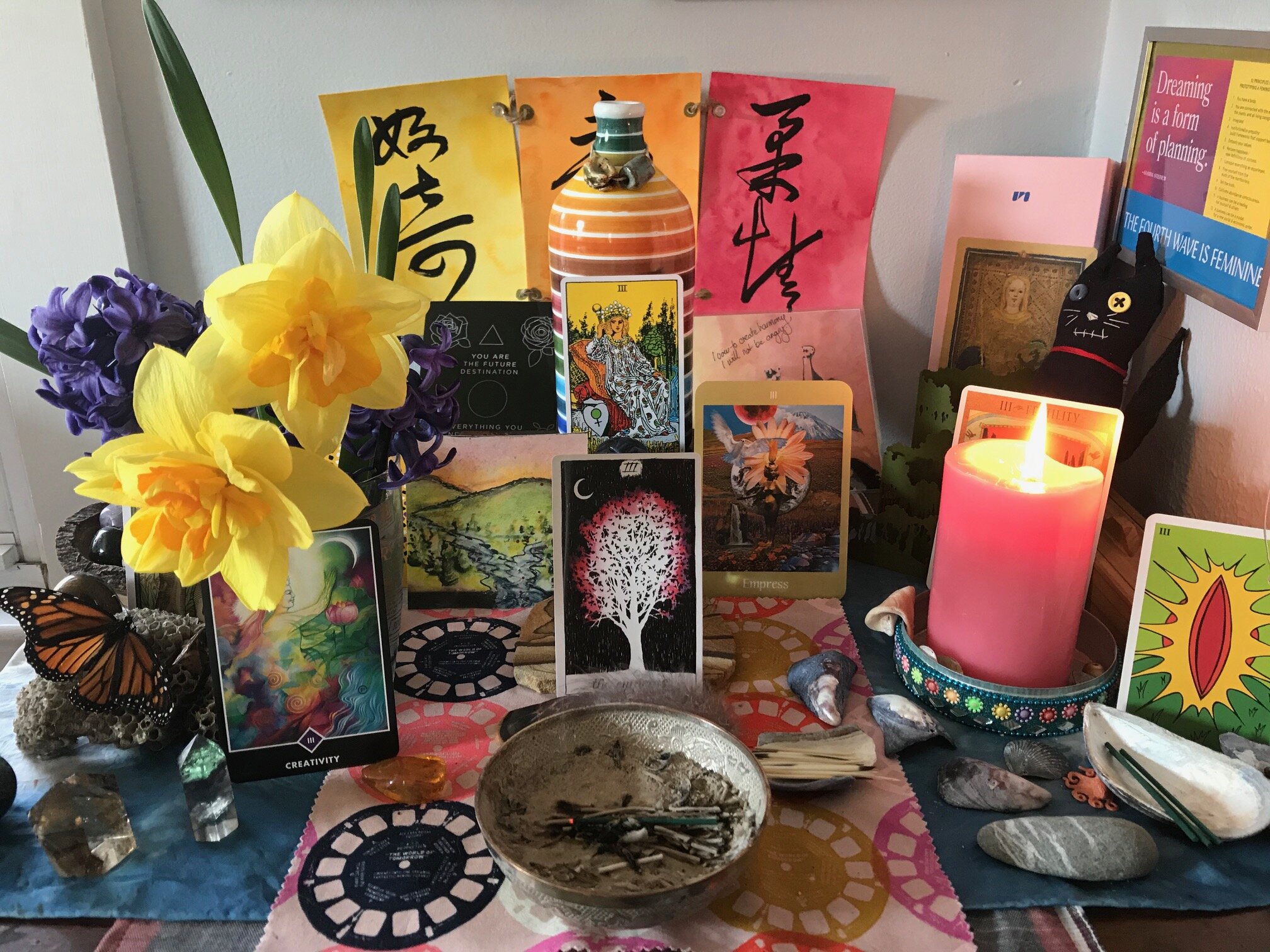   My home altar, with flowers from my front yard  