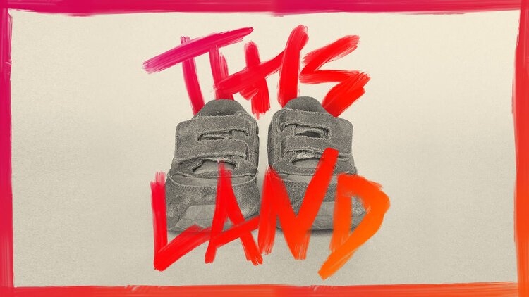 black and white children's velcro sneakers against a light gray background with a red border and the word This Land in red