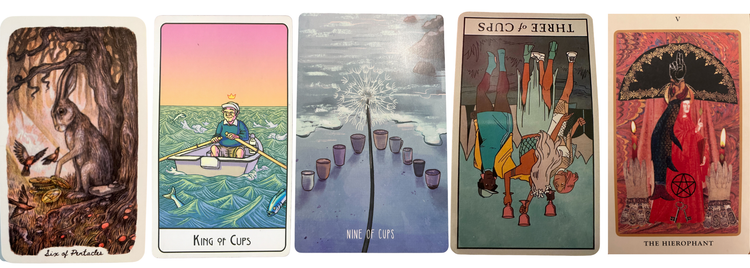 a row of 5 tarot cards from different decks, the fourth one is reversed