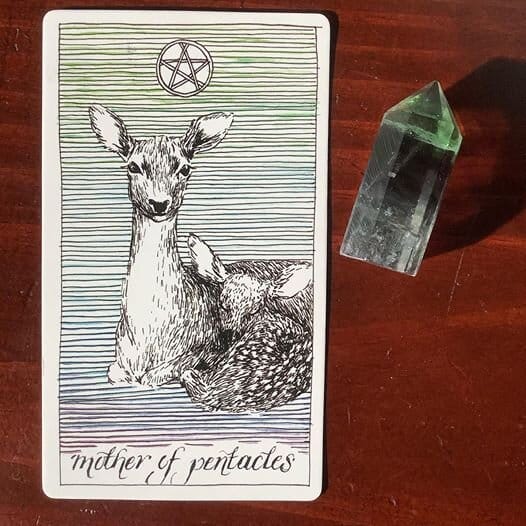 an illustrated doe looks directly at the viewer with a sleeping, big-eared spotted fawn against her body with horizontal lines in a cool green-to-purple ombre in the background